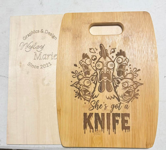 Chicken Panic Edition - 12" × 9" Bamboo Cutting Board – “She’s Got a KNIFE!”